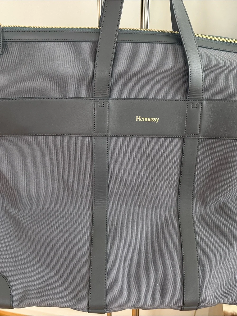 Brand new Hennessy Gray Canvas Duffel Bag with Leather Trim